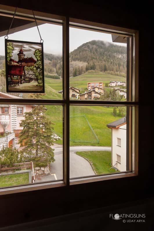 View of the Swiss countryside from inside a kitchen, Samedan