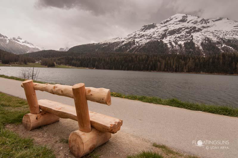 An inviting bench along the lake in St Moritz, against the backdrop of the beautiful Swiss alps covered in snow. The wind was biting but exhilirating!